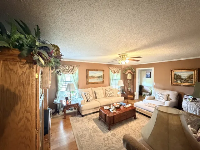 a bathroom with a sink mirror vanity and toilet