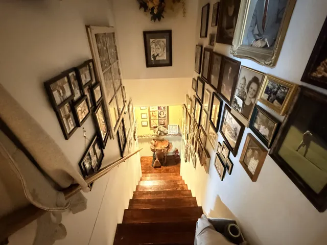 an aerial view of house with yard