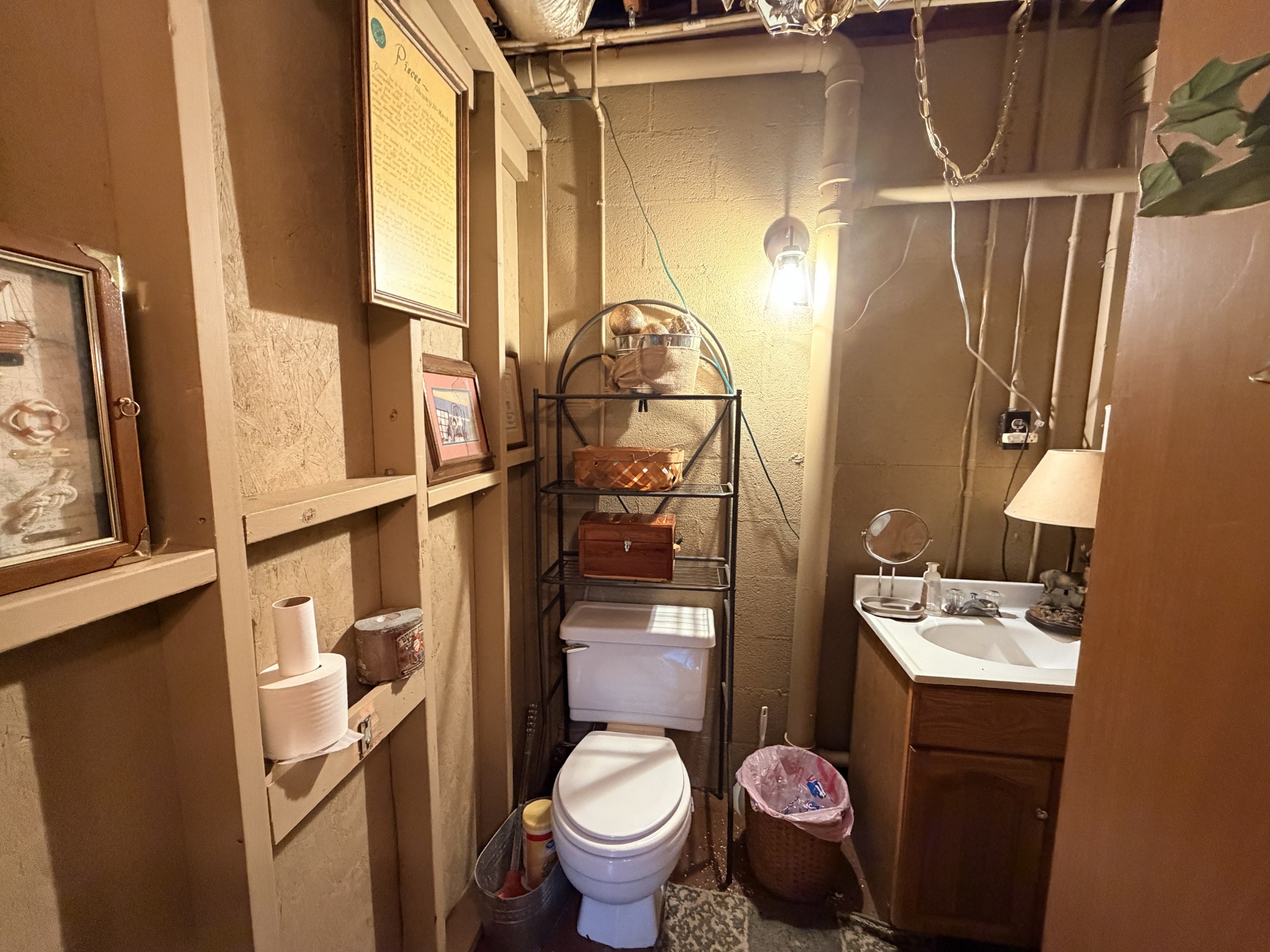 2890 Nance Bend Road Clifton, TN 38425 - Photo 37 of 52 a bathroom with a sink toilet and mirror