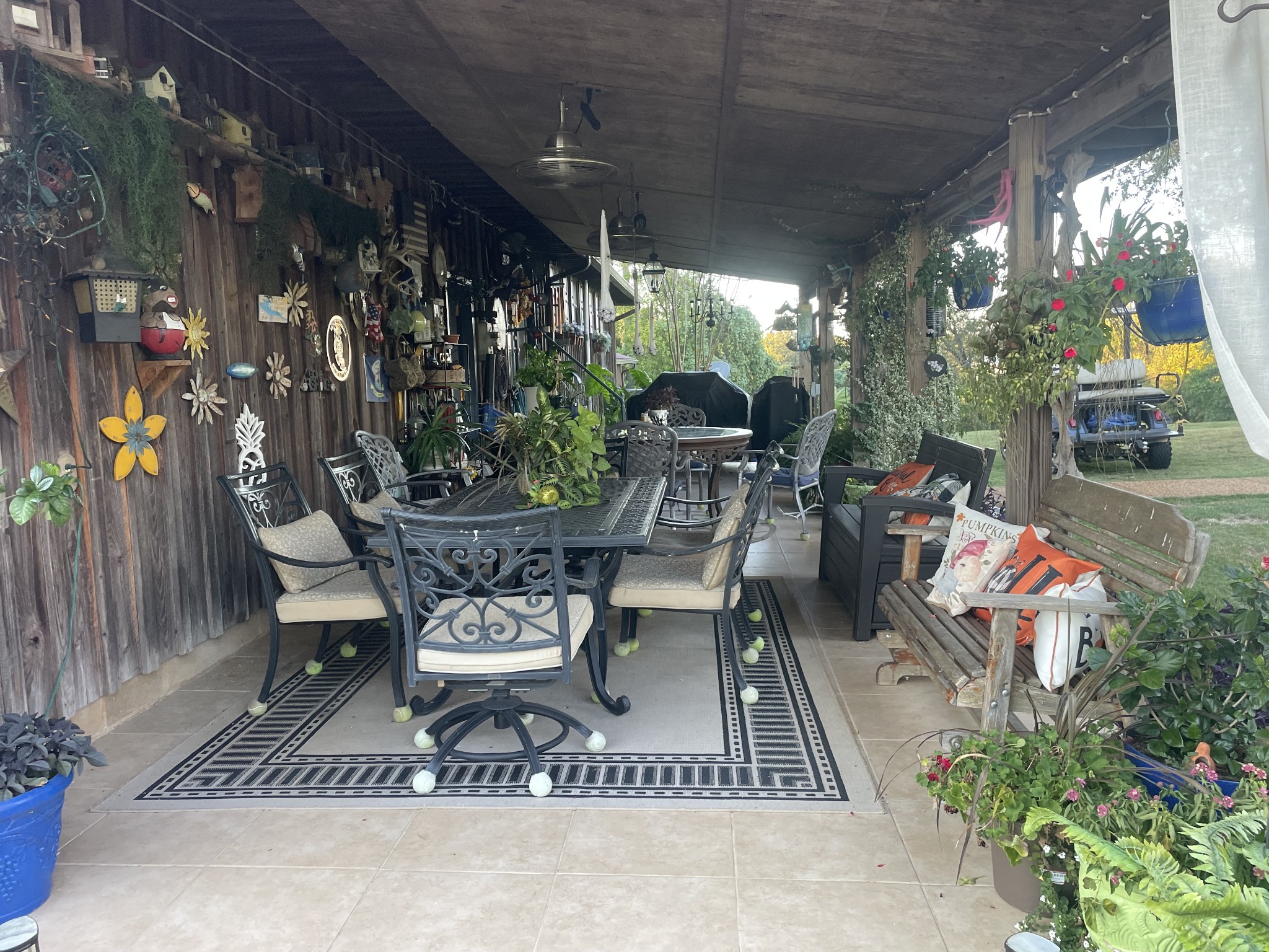2890 Nance Bend Road Clifton, TN 38425 - Photo 4 of 52 a view of a chairs and table in a patio