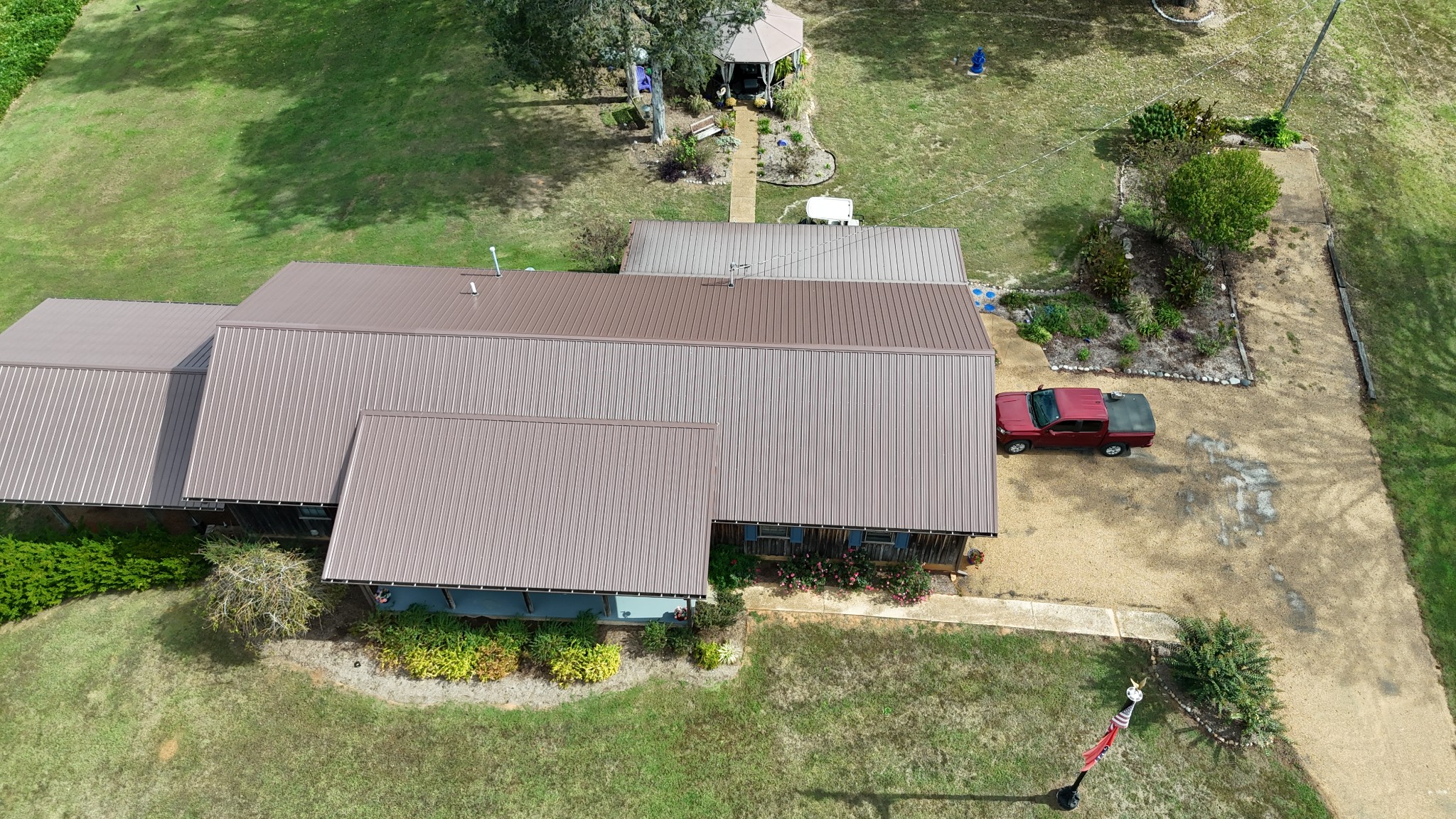 2890 Nance Bend Road Clifton, TN 38425 - Photo 42 of 52 an aerial view of a house with yard swimming pool and outdoor seating