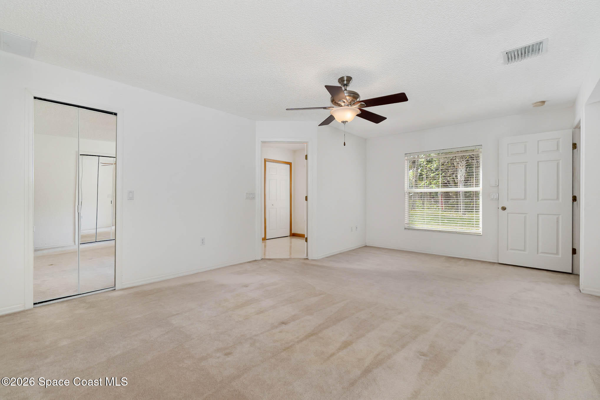 787 Seymour Road Northeast Palm Bay, FL 32905 - Photo 8 of 15 Primary Suite