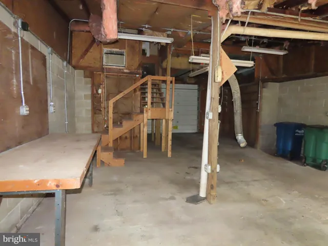 a view of a livingroom with wooden floor