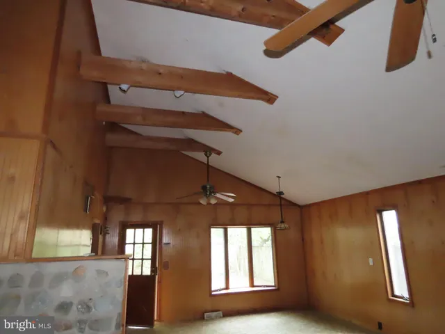 a view of an entryway with a window