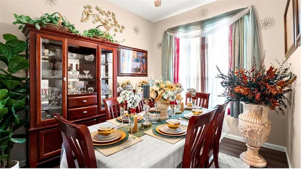 a view of a dining room with furniture window and outside view