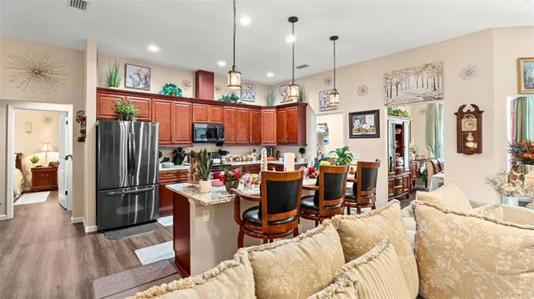 a view of a kitchen and dining room