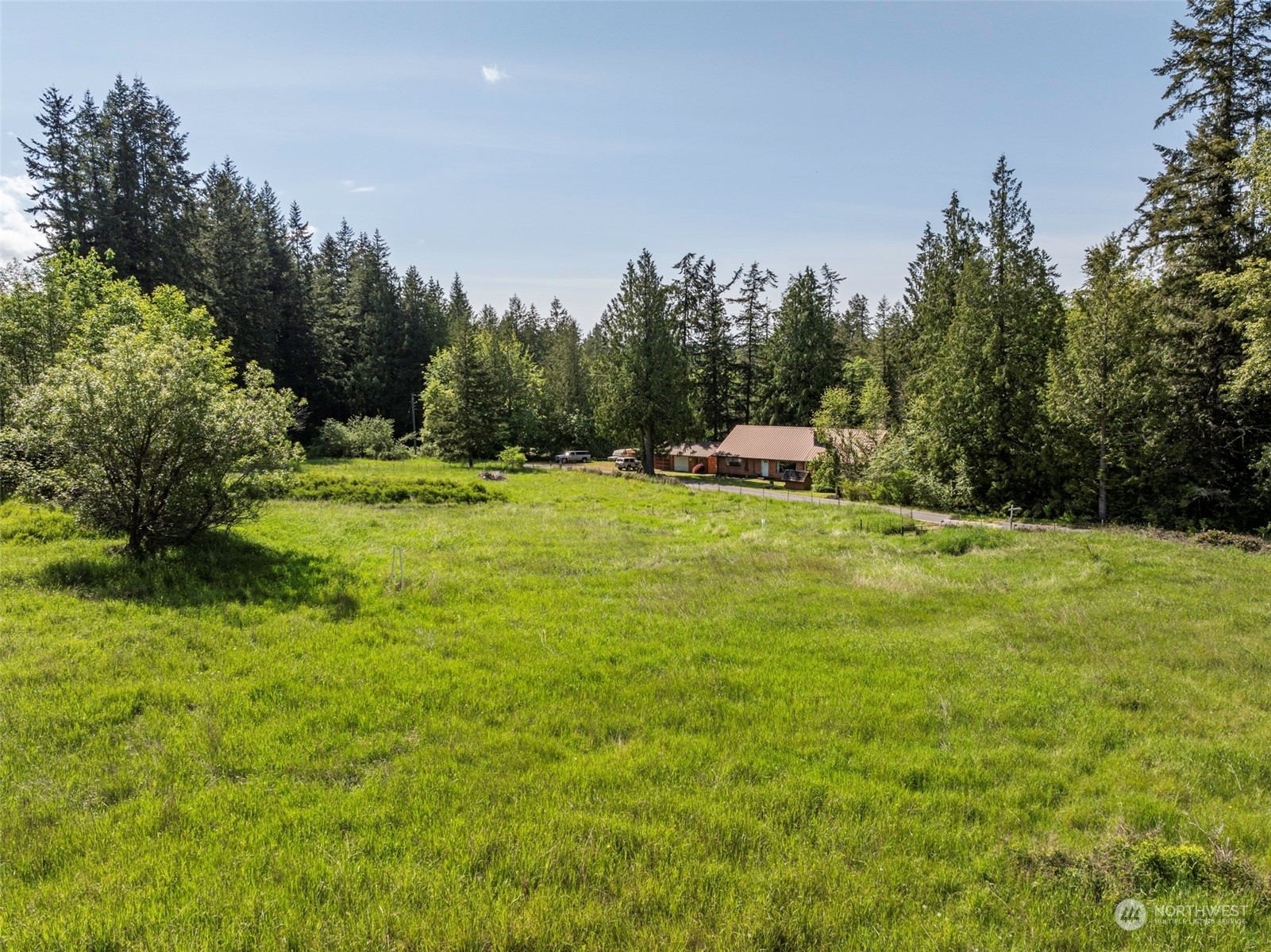 1434 Chicken Coop Road Sequim, WA 98382 - Photo 13 of 25 a view of a golf course with a park