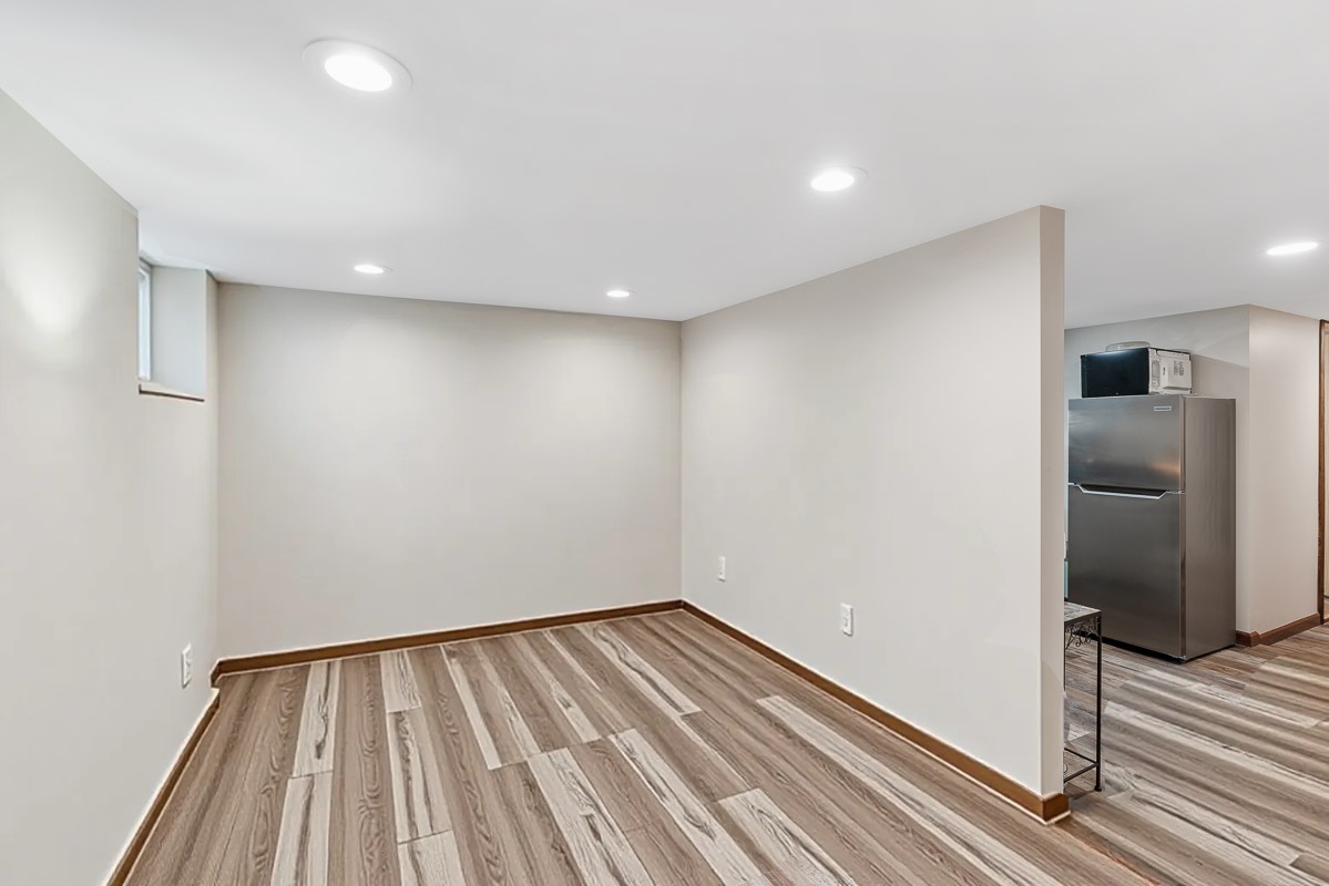 1301 West Nelson Street, Unit G Chicago, IL 60657 - Photo 3 of 19 a view of wooden floor in an empty room