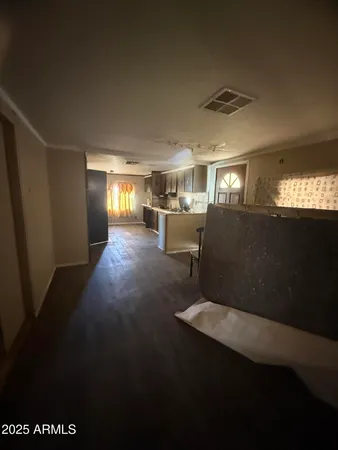 a kitchen with a sink appliances and cabinets