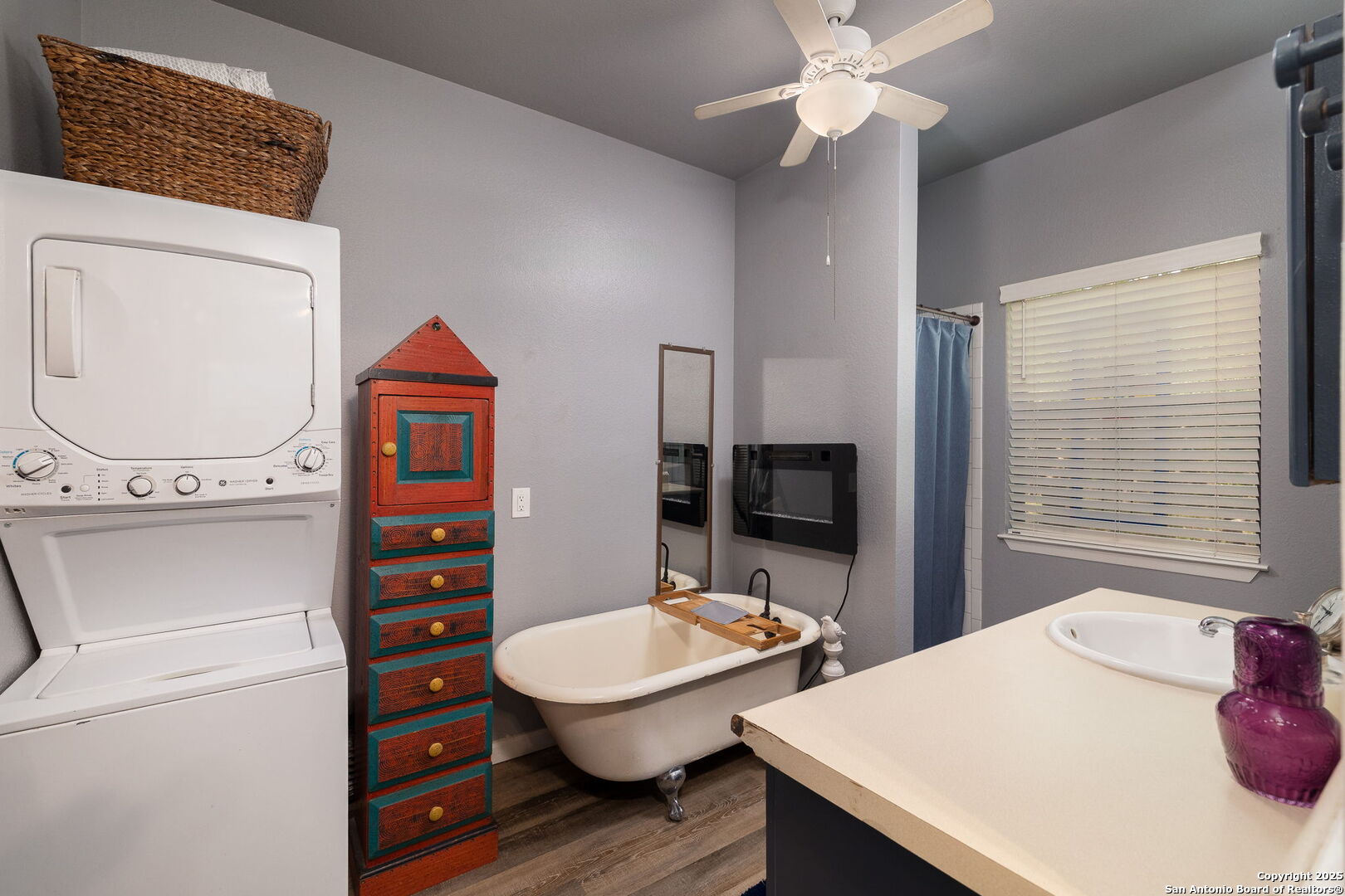 1060 Forest View Drive Blanco, TX 78606 - Photo 12 of 24 a view of a kitchen area with furniture and wooden floor