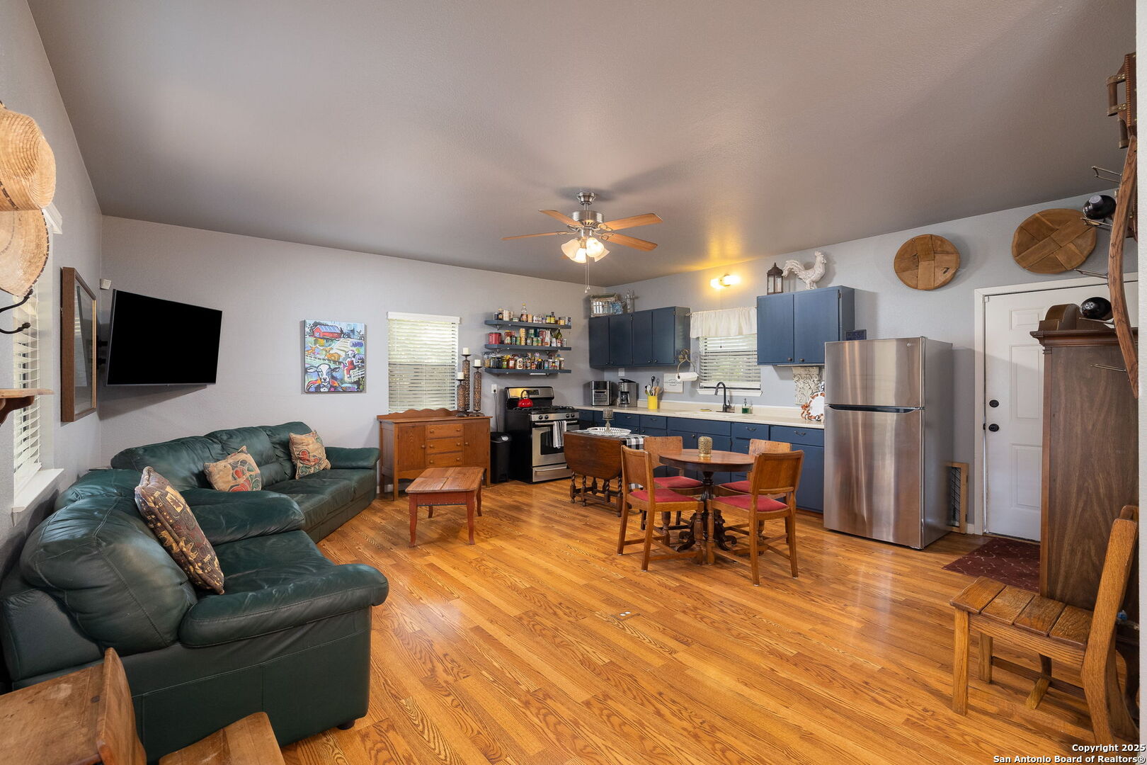 1060 Forest View Drive Blanco, TX 78606 - Photo 14 of 24 a living room with furniture and a flat screen tv