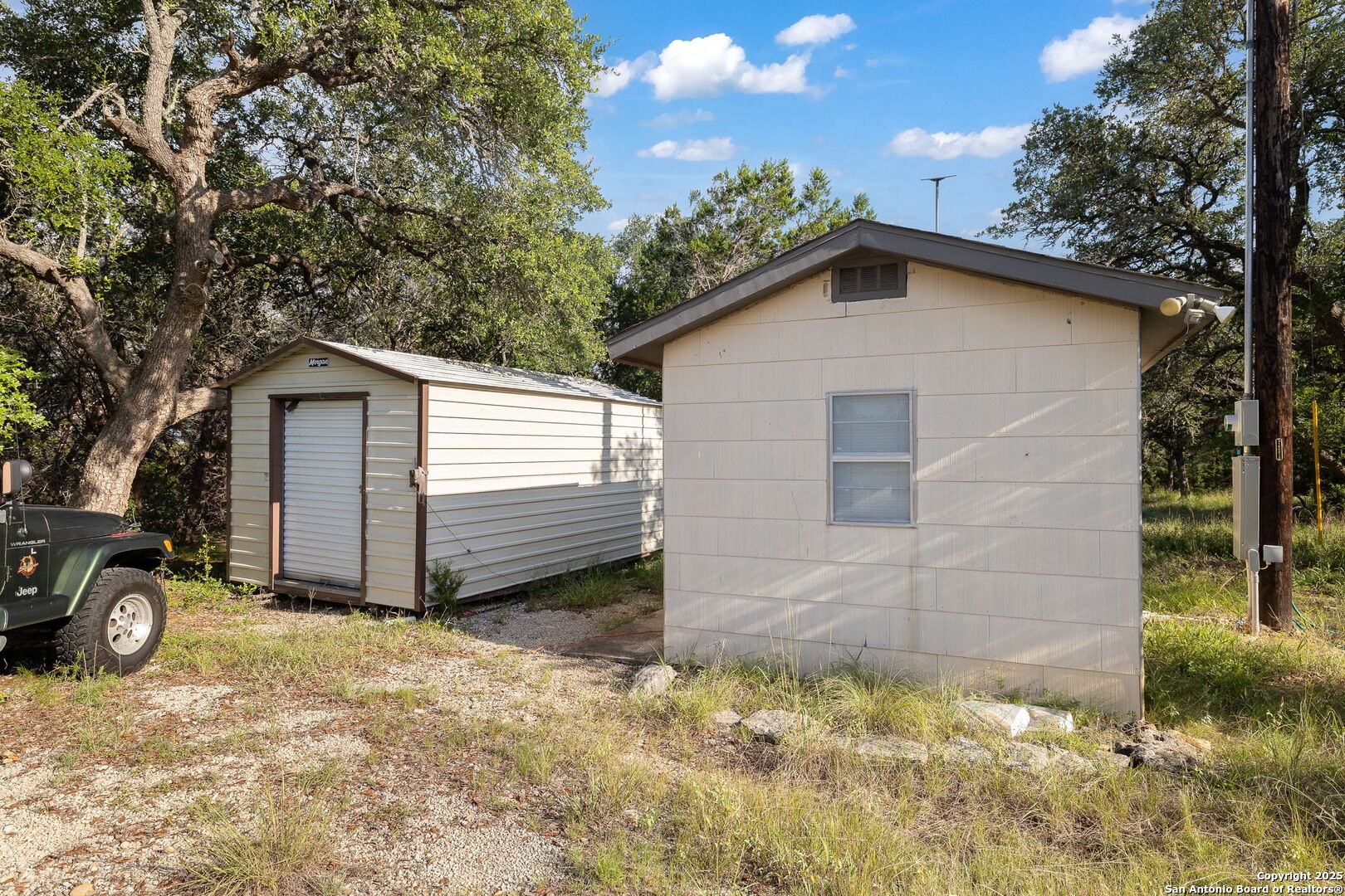 1060 Forest View Drive Blanco, TX 78606 - Photo 18 of 24 a view of a house with a yard