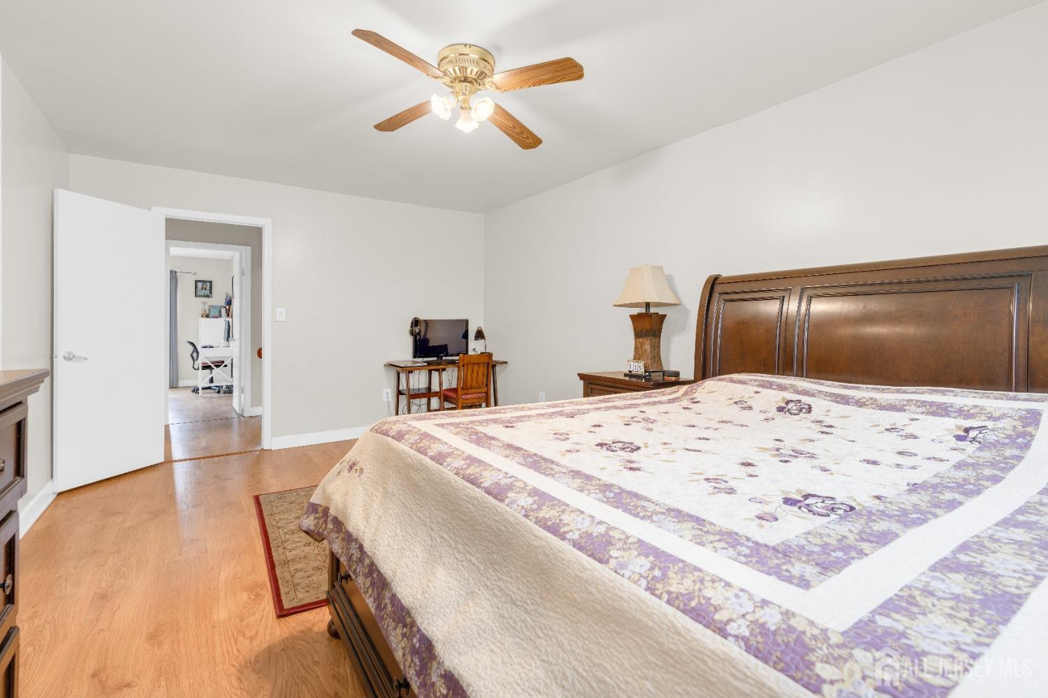 90 Pheasant Run Edison, NJ 08820 - Photo 19 of 39 a bed room with a bed and a television
