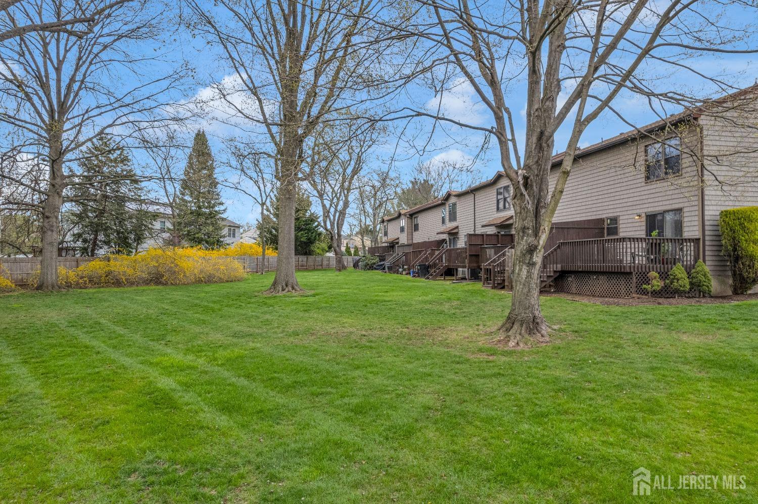 90 Pheasant Run Edison, NJ 08820 - Photo 35 of 39 a view of a house with a backyard