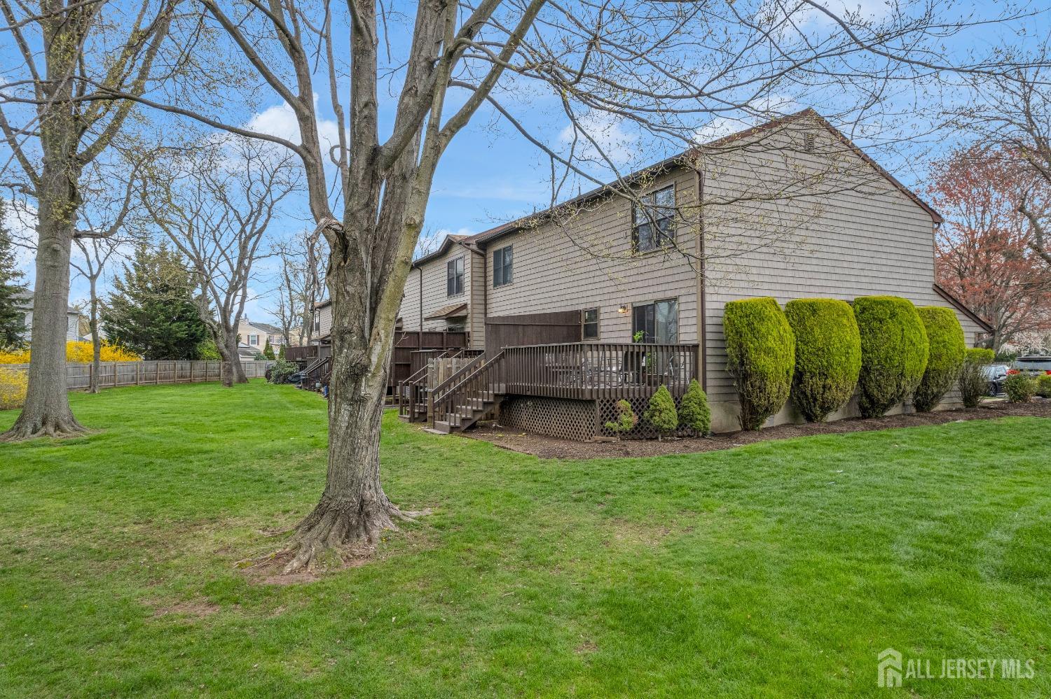90 Pheasant Run Edison, NJ 08820 - Photo 36 of 39 a view of a house with a backyard