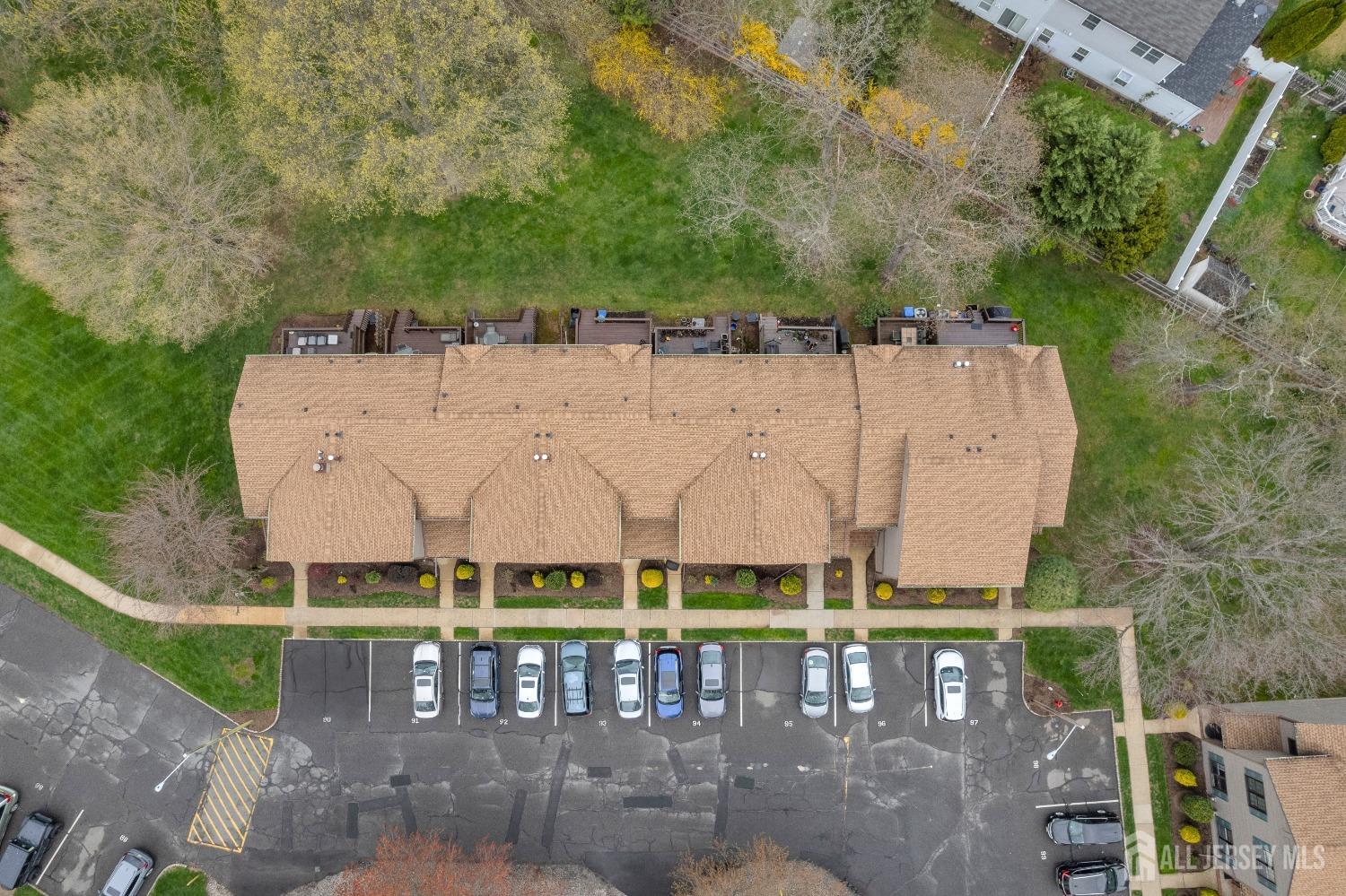 90 Pheasant Run Edison, NJ 08820 - Photo 39 of 39 an aerial view of a brick building with a yard in front of it
