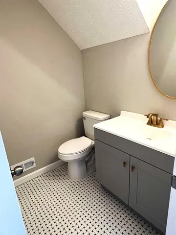 a bathroom with a sink and a toilet