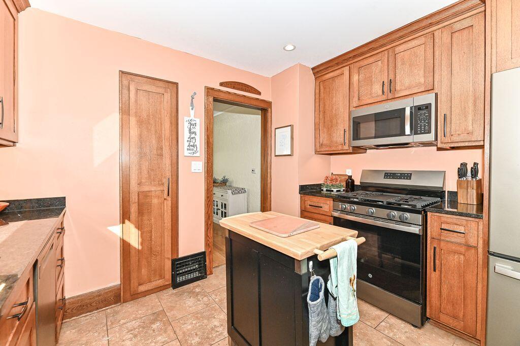 2715 Lasalle Street Racine, WI 53402 - Photo 14 of 35 Kitchen to back hallway and 4th bedroom/Flex Room