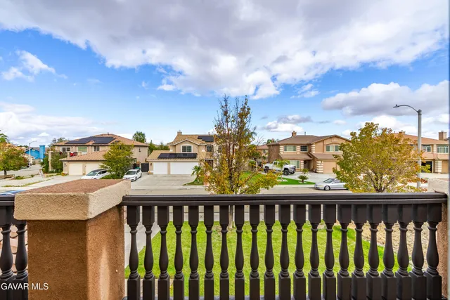 a view of a building from a balcony