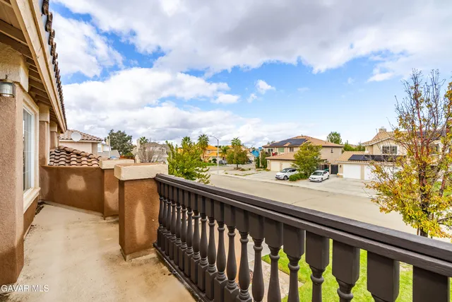 a view of a balcony with city view