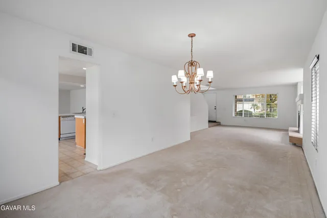 a view of a chandelier in a room