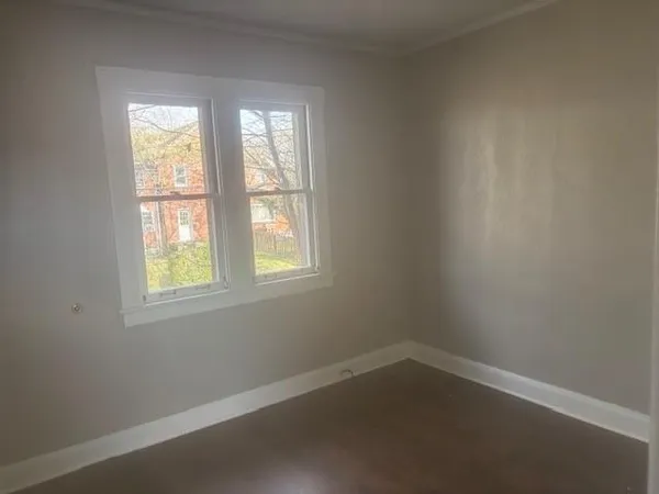 an empty room with a window