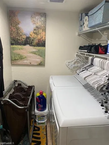a utility room with dryer and washer