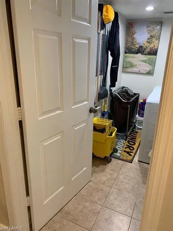 a view of bathroom with mirror