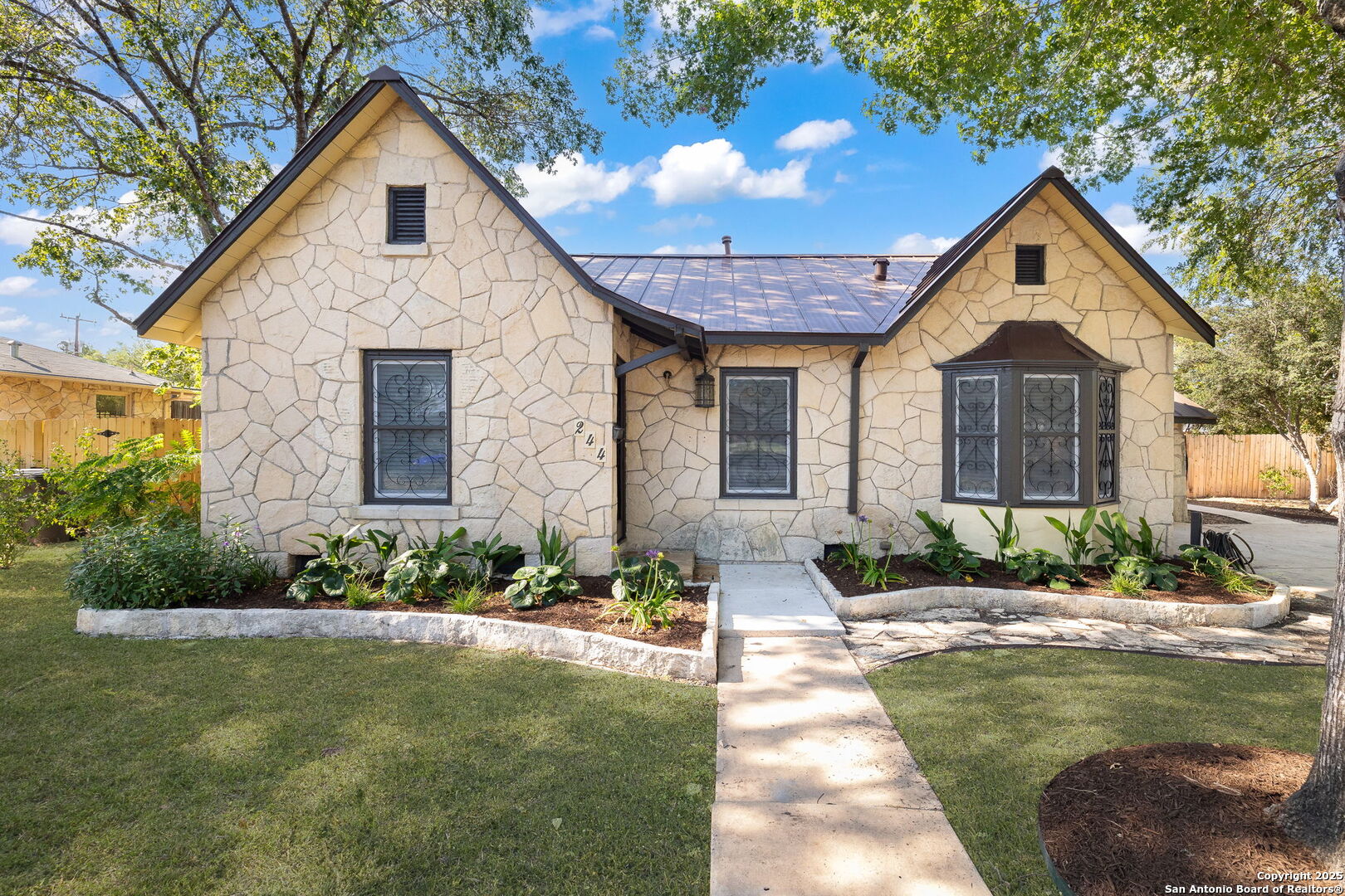 244 Lovera Boulevard San Antonio, TX 78212 - Photo 1 of 1 a front view of a house with a yard