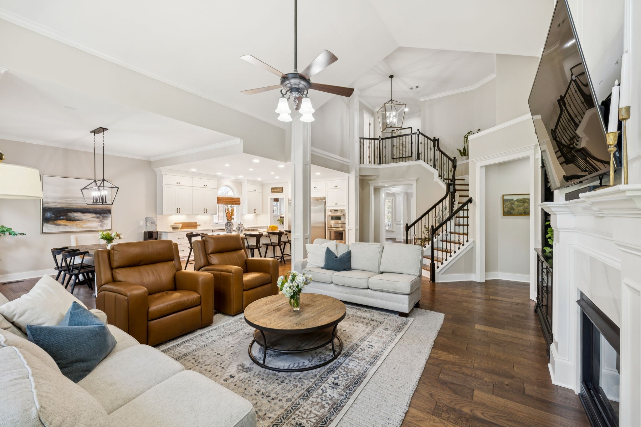 5520 Rathkeale Lane Franklin, TN 37067 - Photo 24 of 89 a living room with furniture fireplace and a chandelier