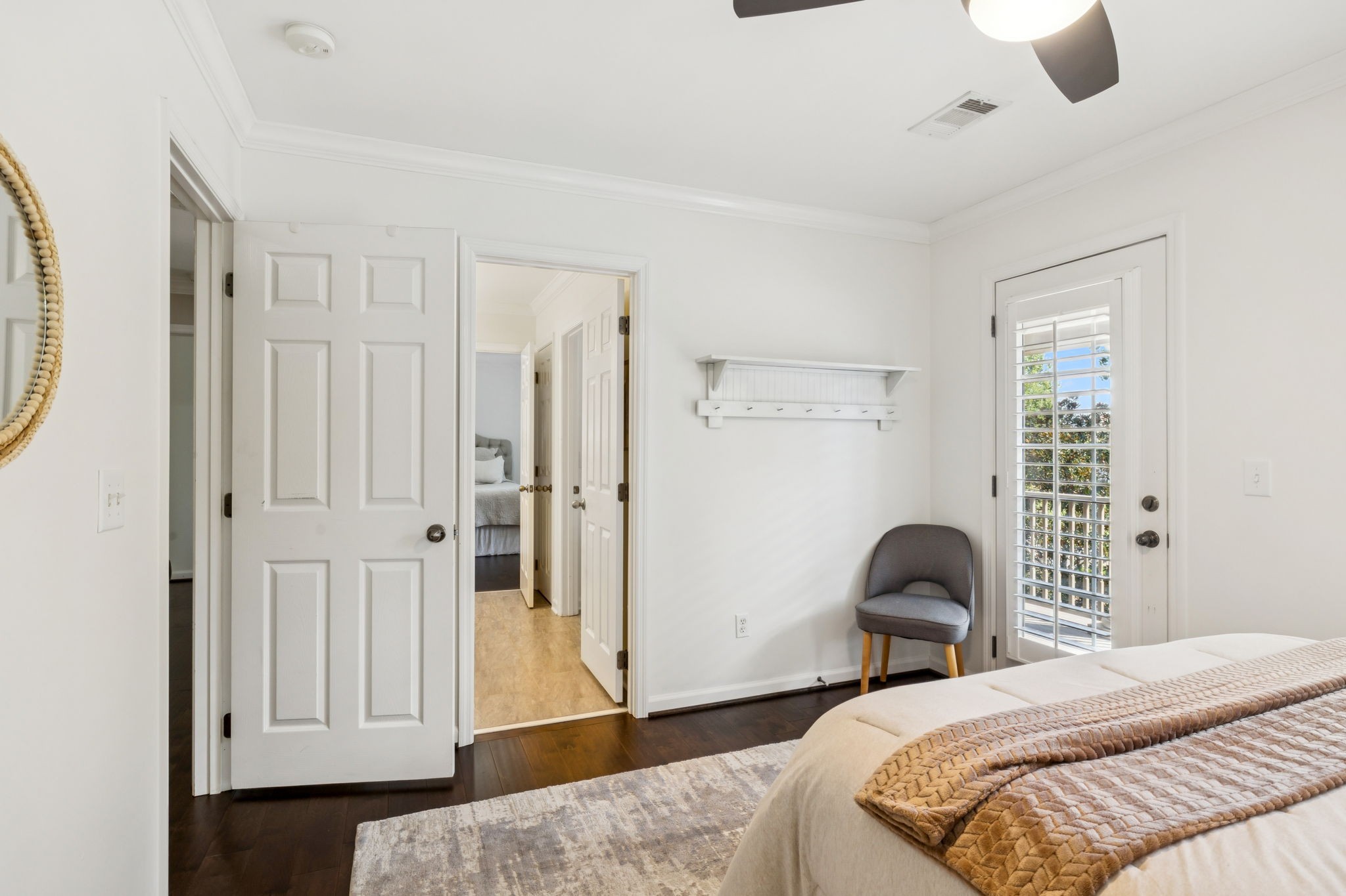 5520 Rathkeale Lane Franklin, TN 37067 - Photo 55 of 89 a bedroom with a bed and a chair with the wooden floor