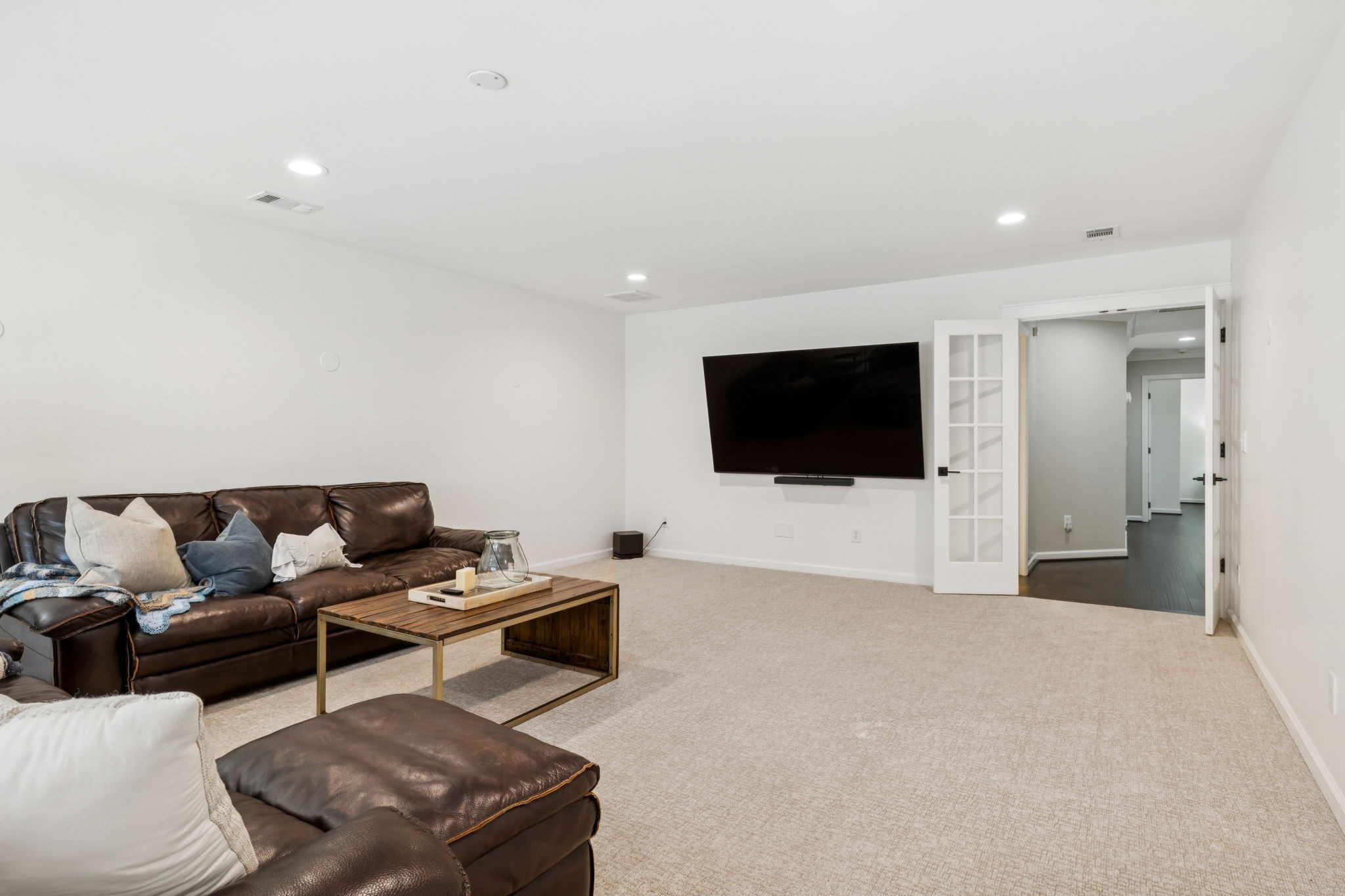 5520 Rathkeale Lane Franklin, TN 37067 - Photo 58 of 89 a living room with furniture and a flat screen tv