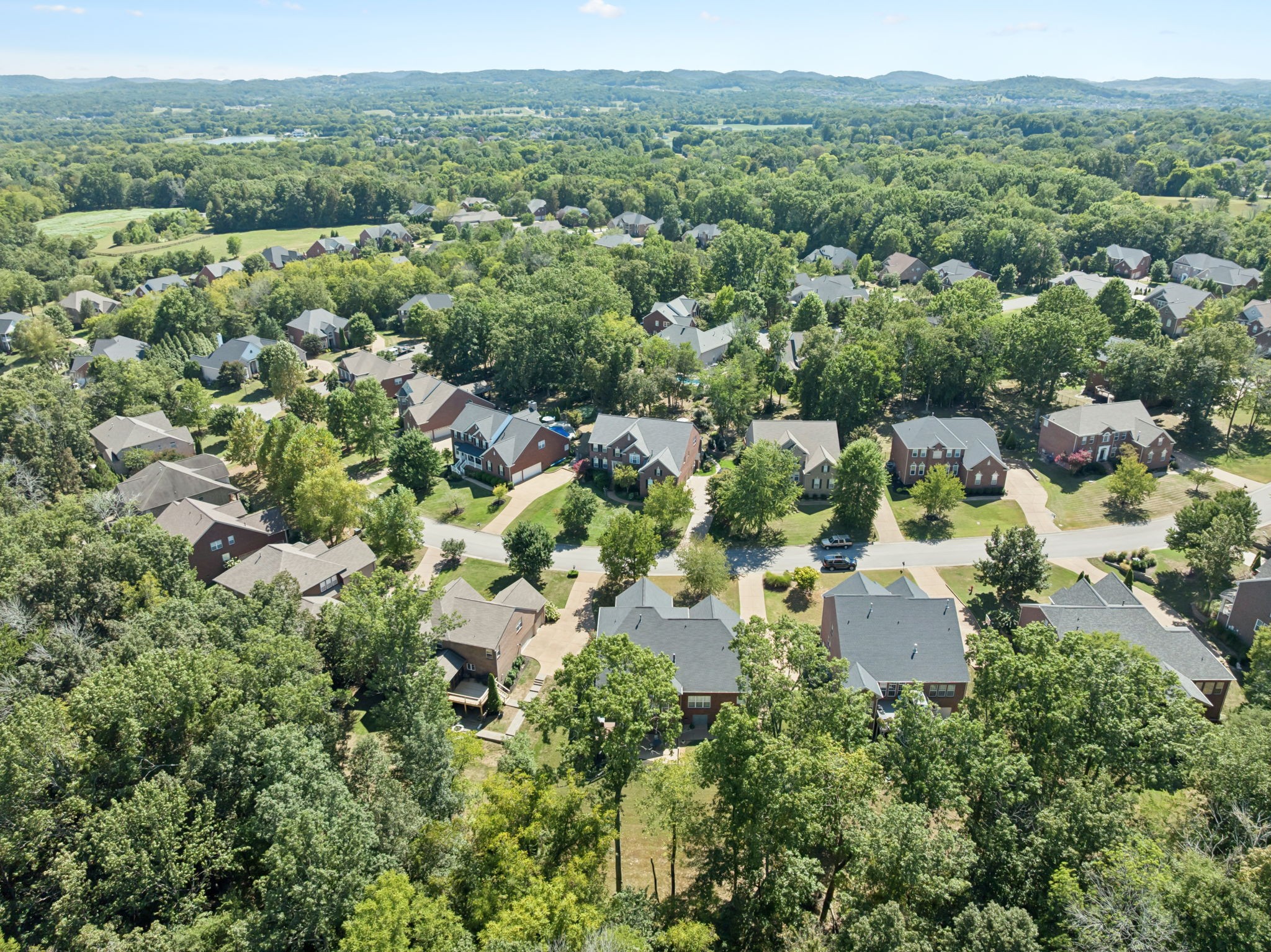 5520 Rathkeale Lane Franklin, TN 37067 - Photo 85 of 89 an aerial view of residential houses with outdoor space and trees