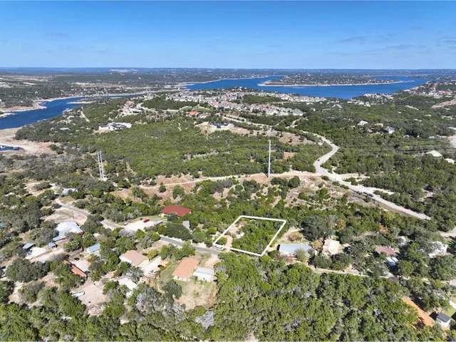 a view of a city with an ocean