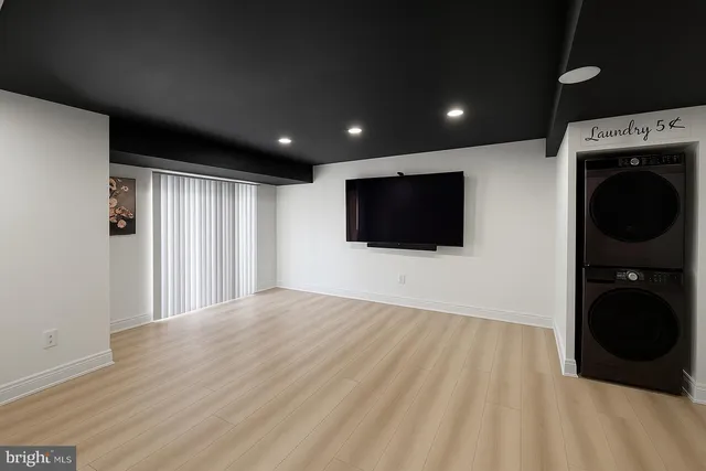 a view of a livingroom with a flat screen tv
