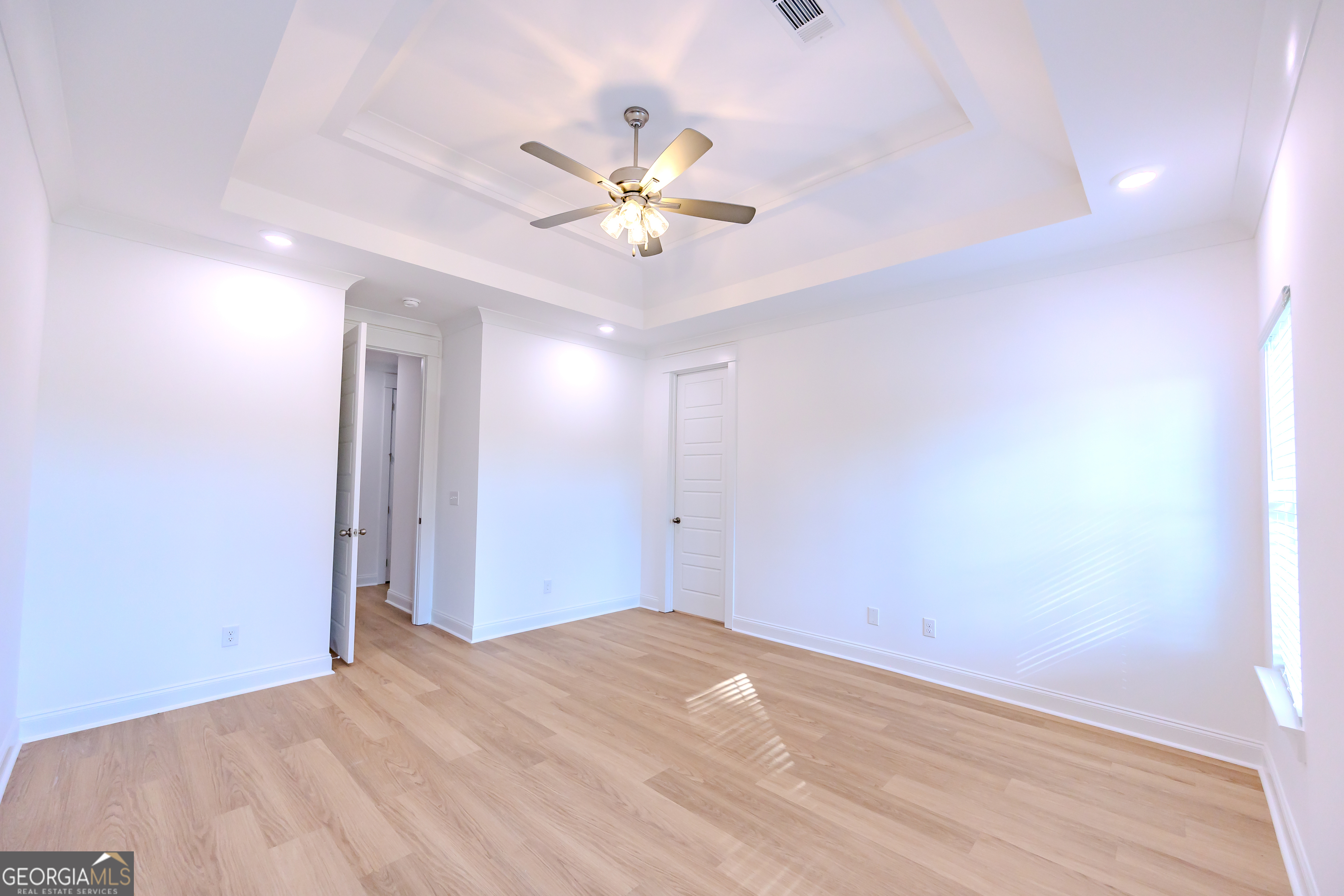 336 Mace Cannon Road Dublin, GA 31021 - Photo 33 of 62 a view of a livingroom with a ceiling fan and window