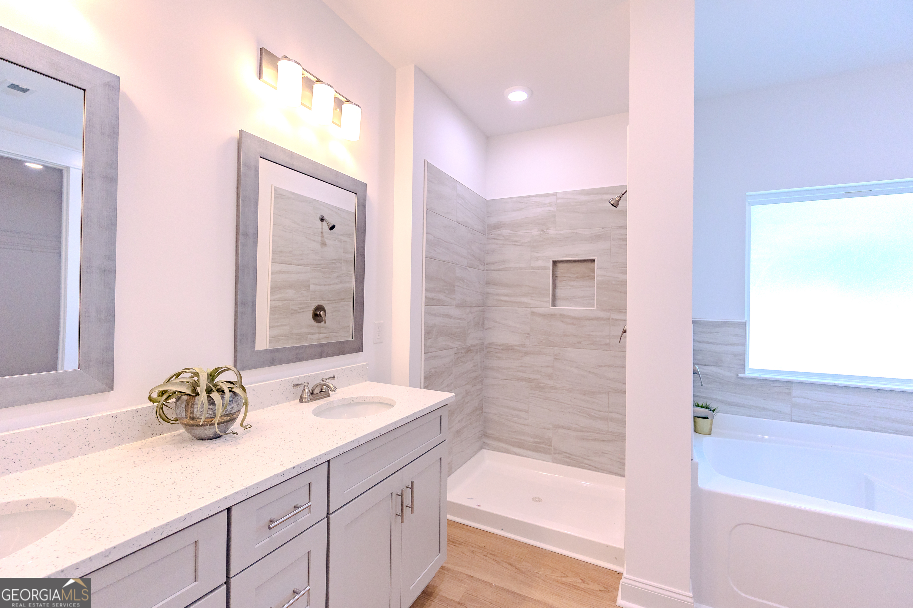 336 Mace Cannon Road Dublin, GA 31021 - Photo 34 of 62 a bathroom with a granite countertop sink a toilet and shower