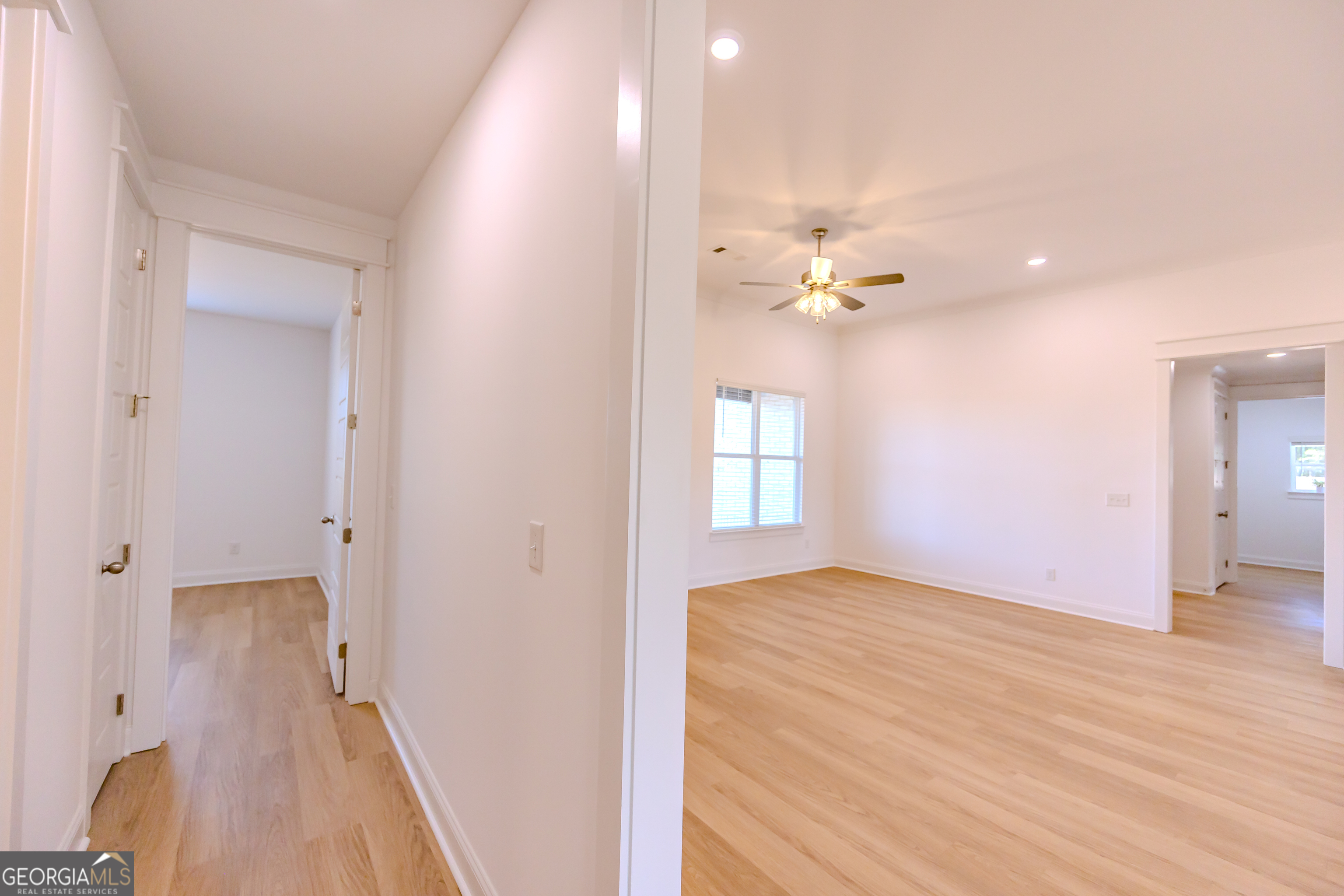 336 Mace Cannon Road Dublin, GA 31021 - Photo 43 of 62 wooden floor in an empty room with a window
