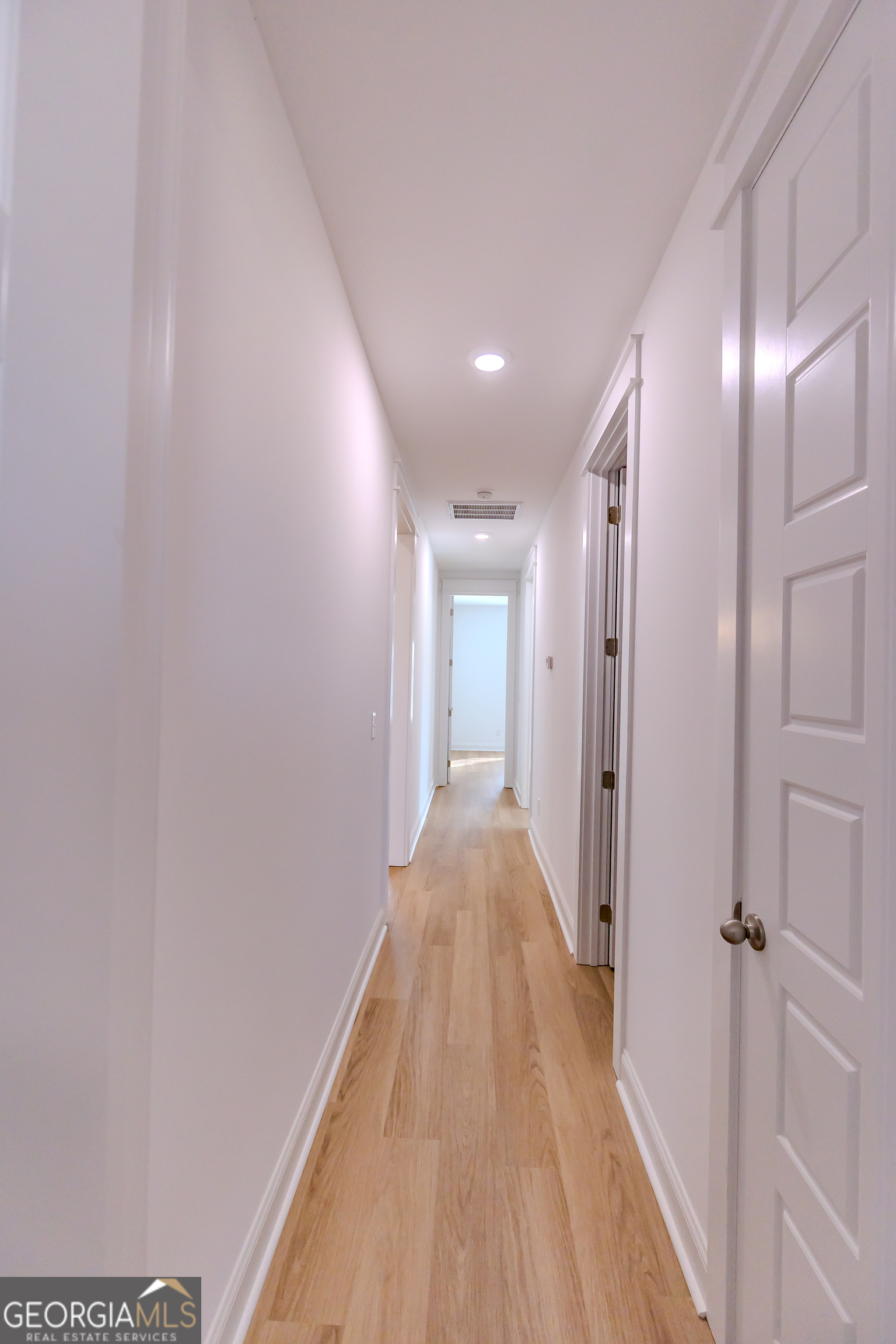 336 Mace Cannon Road Dublin, GA 31021 - Photo 46 of 62 a view of a hallway with wooden floor