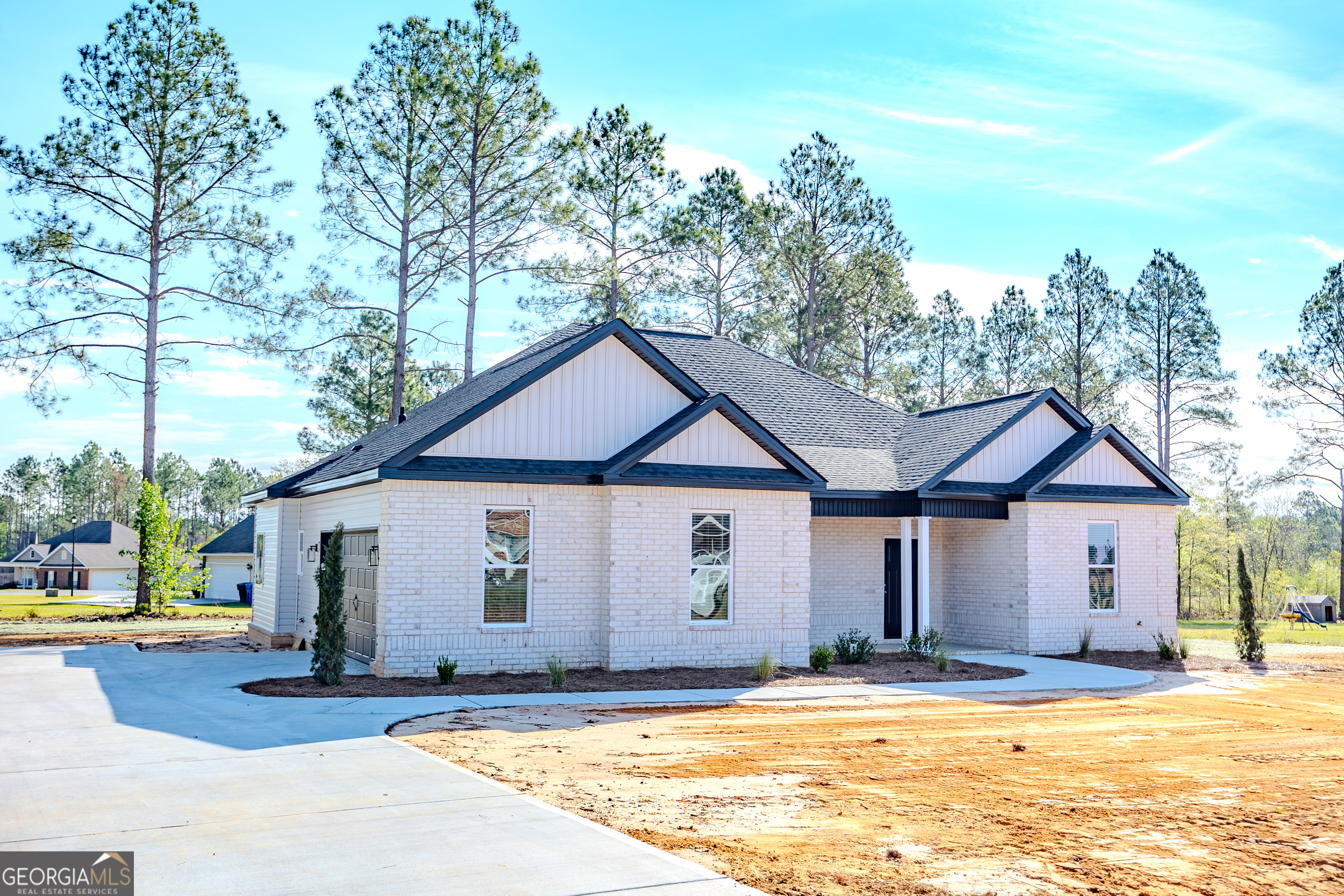 336 Mace Cannon Road Dublin, GA 31021 - Photo 5 of 62 a view of a house with a big yard and large tree