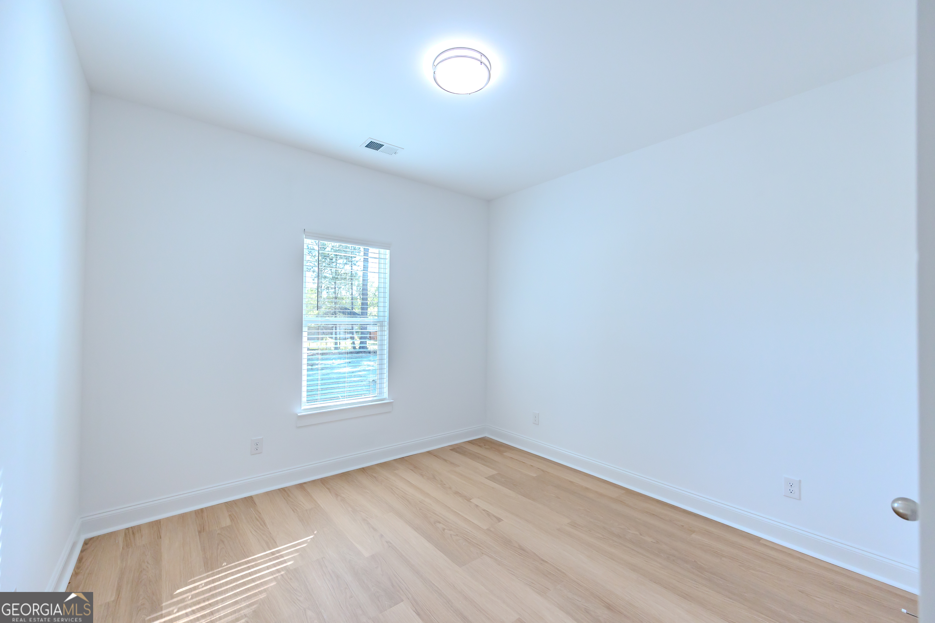 336 Mace Cannon Road Dublin, GA 31021 - Photo 53 of 62 an empty room with a window