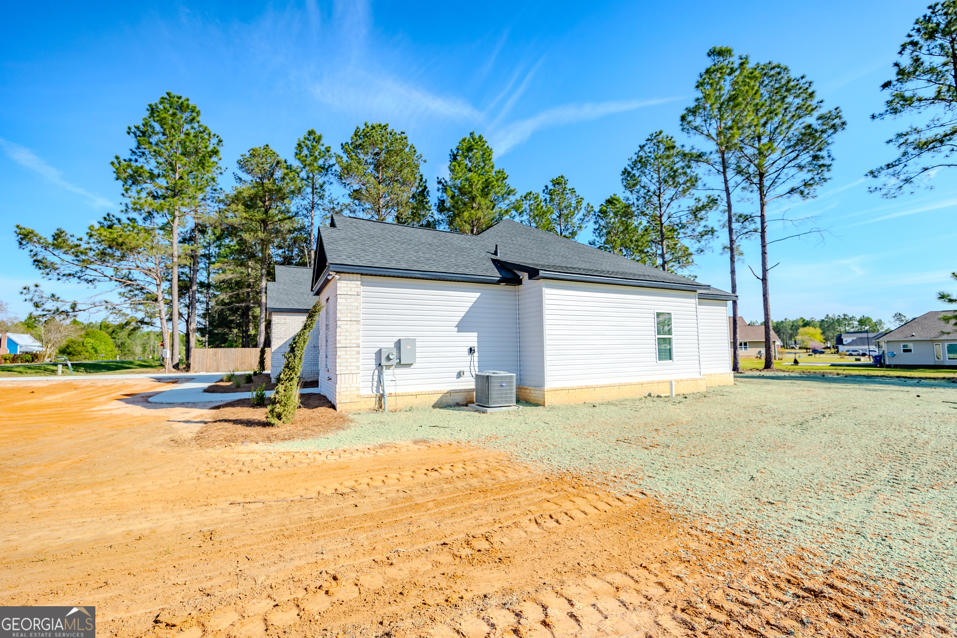 336 Mace Cannon Road Dublin, GA 31021 - Photo 7 of 62 a house with trees in the background