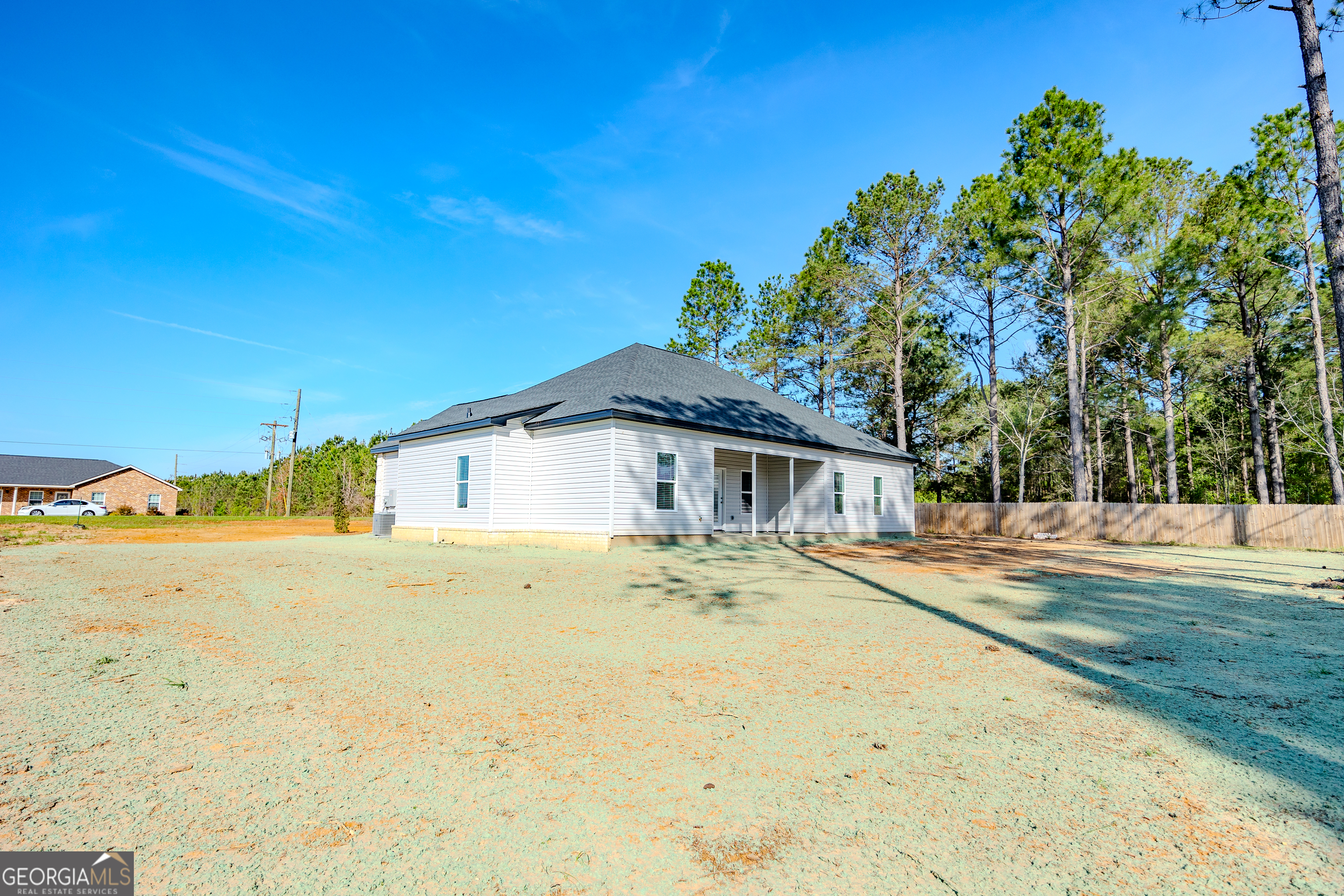 336 Mace Cannon Road Dublin, GA 31021 - Photo 8 of 62 a house with trees in the background