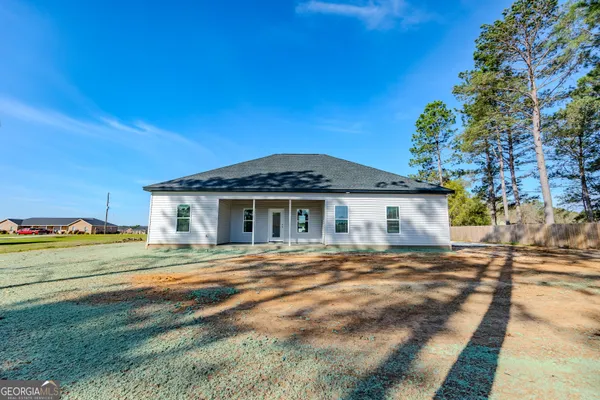 a view of a house with a patio