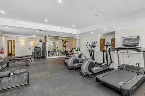 a view of a room with gym equipment