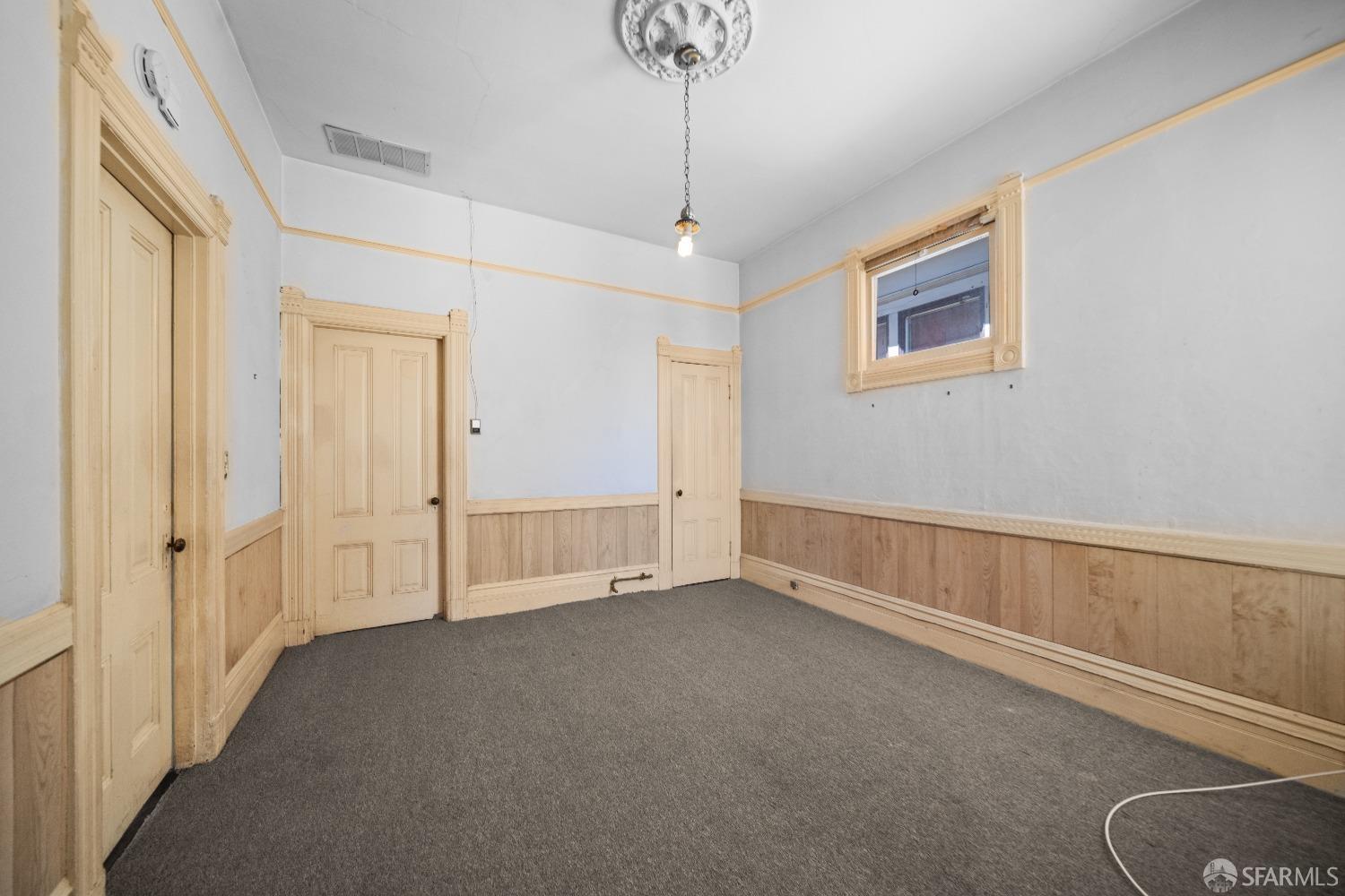 705 Jackson Street Oakland, CA 94607 - Photo 25 of 40 a view of an empty room with a window