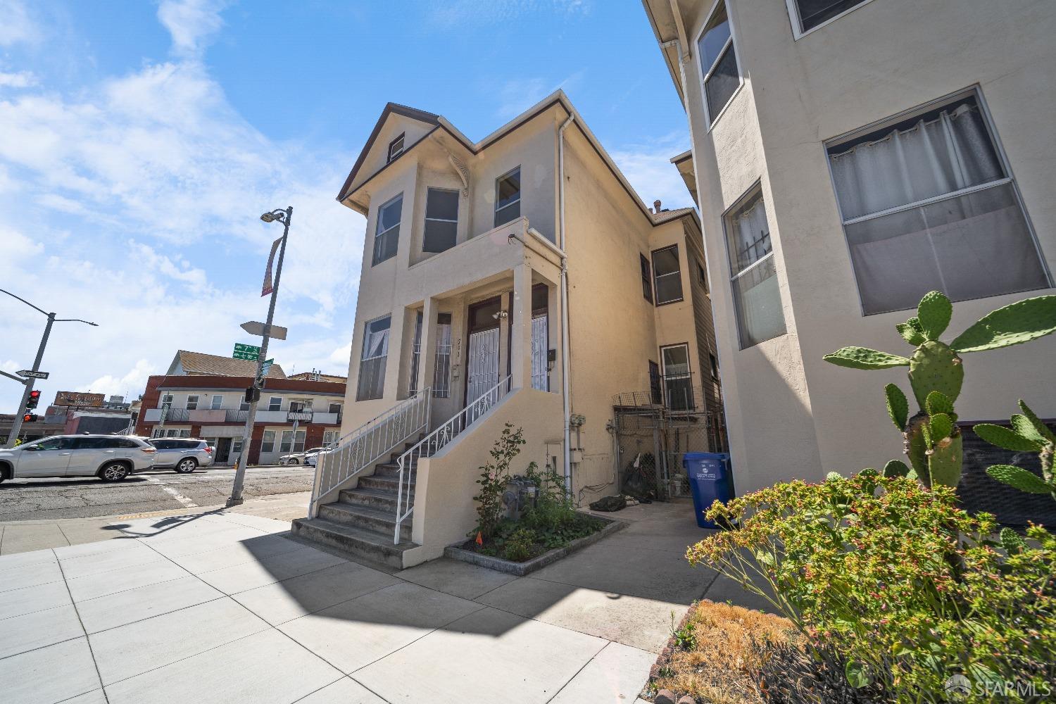 705 Jackson Street Oakland, CA 94607 - Photo 7 of 40 a front view of a house with garden