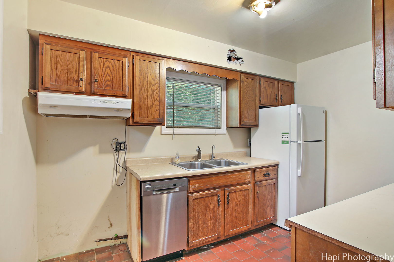 4906 Maple Hill Drive McCullom Lake, IL 60050 - Photo 7 of 23 a kitchen with stainless steel appliances granite countertop a sink stove and refrigerator