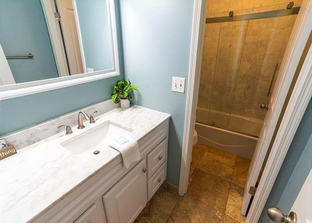 78 North Myrtle Drive, Unit 110 Santa Rosa Beach, FL 32459 - Photo 12 of 19 a bathroom with a sink and a mirror
