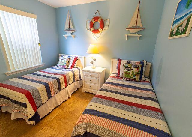 78 North Myrtle Drive, Unit 110 Santa Rosa Beach, FL 32459 - Photo 16 of 19 a bedroom with a bed and a window